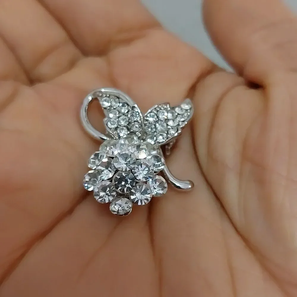 Vintage Unknown Mark Rhinestone Crystals Flower Stem Silver Tone Lapel Pin